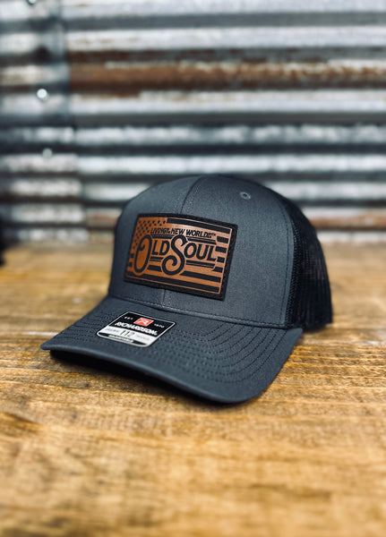 Living in a new world with an old soul Trucker Hat